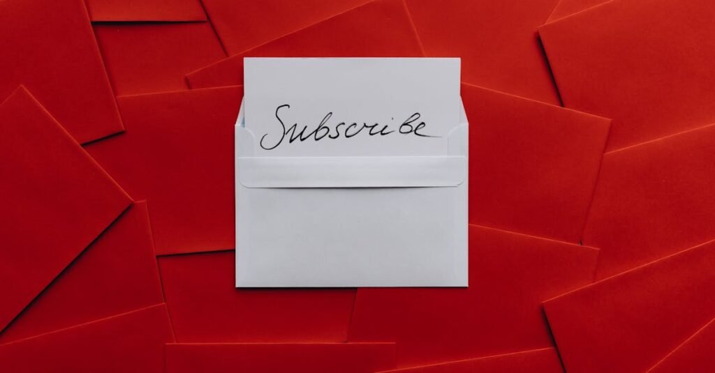 A collection of red envelopes with a central white envelope containing a subscribe card. Perfect for marketing themes.